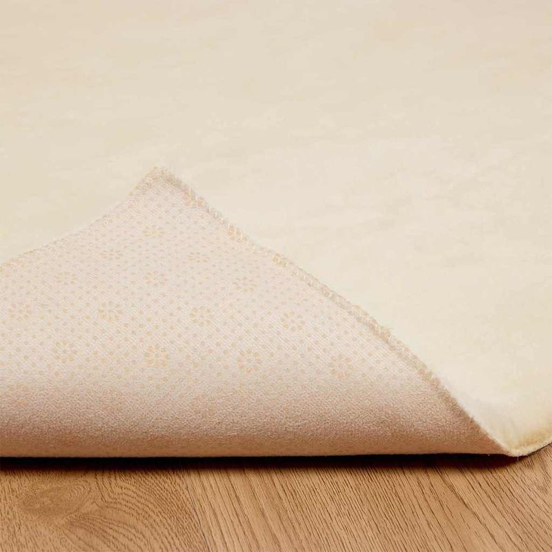 Casa si Gradina - Textile si covoare - Covoare - Covoare casa - Covor din Blana Faux de Iepure Crem 80 x 200 cm Poliester - Infinity.ro