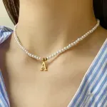 Fashion, accesorii si bijuterii - Femei - Bijuterii femei - Coliere femei - Colier din perle cu litere - Q - Infinity.ro