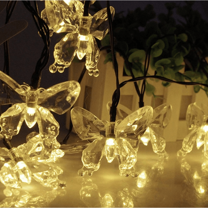 Casa si Gradina - Corpuri si surse de iluminat - Iluminat exterior - Instalatii luminoase exterior - Instalatie 1500-11 Solara 50 LED - FLUTURI Crystal ALB CALD 5m - Infinity.ro