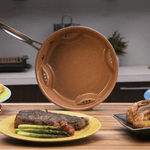 Casa si Gradina - Bucatarie si vesela - Vase pentru gatit - Tigai si seturi - Tigaie portocalie rotunda cu aer - Infinity.ro