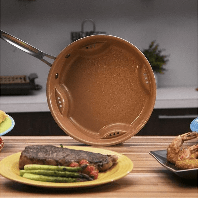 Casa si Gradina - Bucatarie si vesela - Vase pentru gatit - Tigai si seturi - Tigaie portocalie rotunda cu aer - Infinity.ro