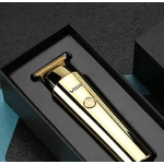 Ingrijire personala si Cosmetice - Aparate & accesorii ingrijire personala - Aparate de ras si tuns - Aparate de tuns - Aparat de tuns VGR 947 Auriu cu 4 atasamente - Infinity.ro