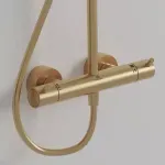 Casa si Gradina - Sanitare - Cazi si cabine de dus - Coloane si seturi de dus - Coloana de dus cu baterie termostatata auriu periat Ideal Standard Ceratherm T125 - Infinity.ro