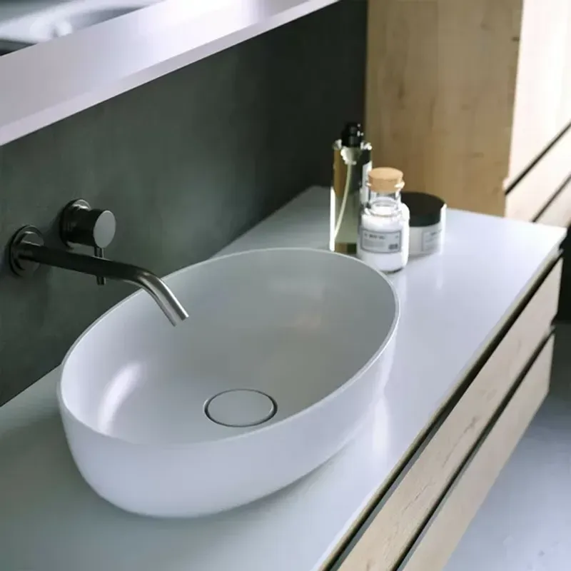 Casa si Gradina - Sanitare - Lavoar baie si accesorii - Lavoare si piedestale - Lavoar pe blat KolpaSan Alexis 55 cm alb - Infinity.ro