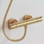 Casa si Gradina - Sanitare - Lavoar baie si accesorii - Baterii sanitare - Baterie dus termostatata Ideal Standard Ceratherm T125 auriu periat - Infinity.ro