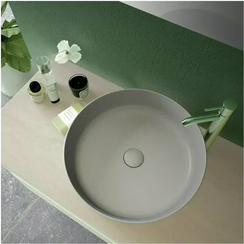 Casa si Gradina - Sanitare - Lavoar baie si accesorii - Lavoare si piedestale - Lavoar pe blat Rak Feeling rotund 42 cm alb lucios - Infinity.ro