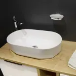 Casa si Gradina - Sanitare - Lavoar baie si accesorii - Lavoare si piedestale - Lavoar pe blat alb Fluminia Ariel 55 cm - Infinity.ro