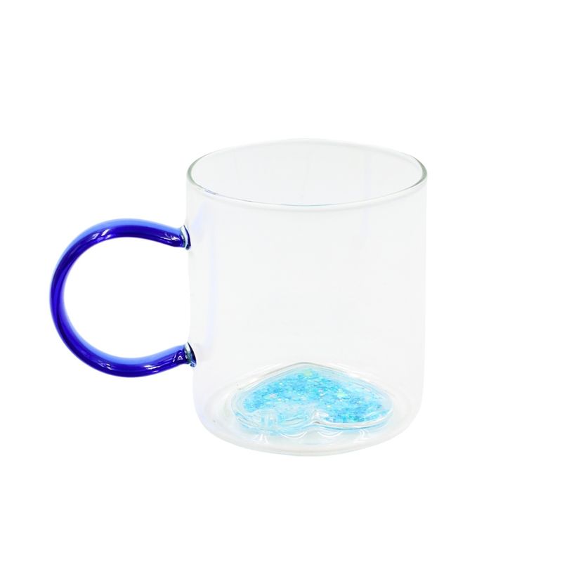 Casa si Gradina - Bucatarie si vesela - Cani si pahare - Cani si cesti - Cana cu model 3D inimioara albastra, pereti dubli, sticla borosilicata si insertie de sclipici, 300 ml, Aurora Glow - Infinity.ro