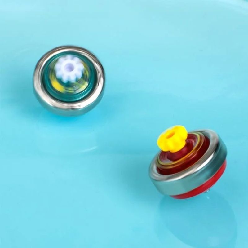 Jucarii, Copii si Bebe - Jucarii si jocuri - Jucarii & jocuri educative - Jucarii interactive - Set de lupta cu titirezi si lansatori - Dimensiuni 45.5x8x45cm - Mmulticolor - Infinity.ro