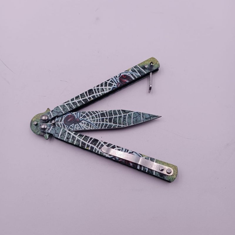 Sport si Outdoor - Camping - Cutite, bricege si accesorii - Cutite si bricege - Cutit Fluture cu Tais, Model Paianjen, Deschidere Manuala, Sistem Prindere Curea, 22 cm, Multicolor - Infinity.ro