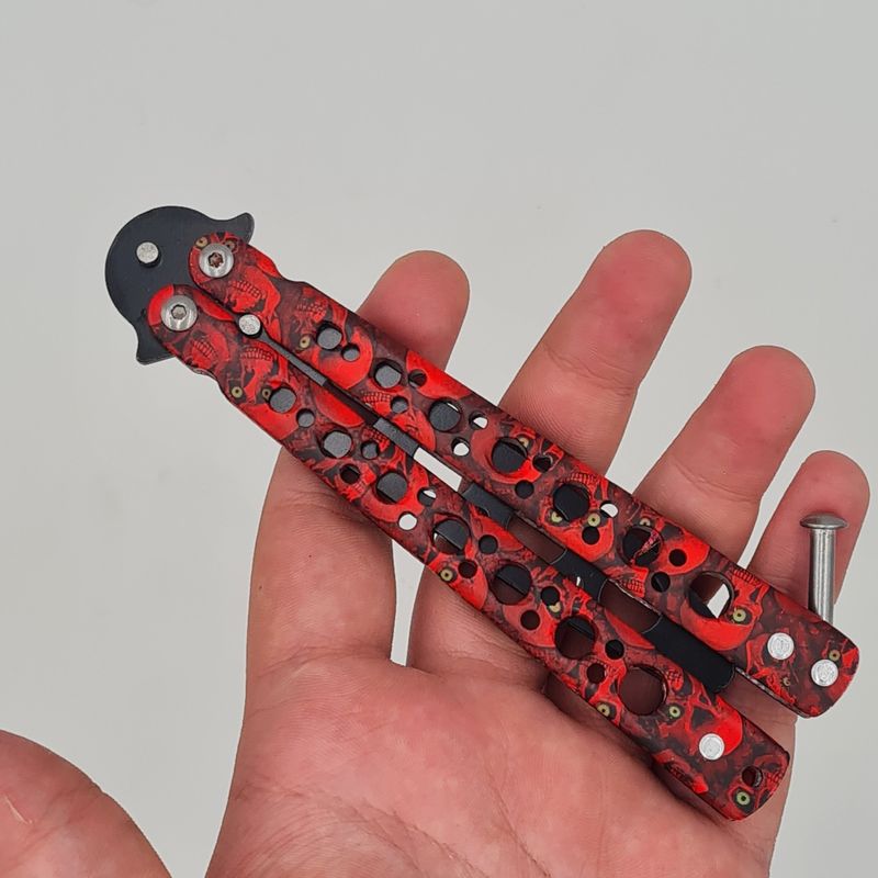 Sport si Outdoor - Camping - Cutite, bricege si accesorii - Cutite si bricege - Cutit fluture Butterfly, Balisong  22 cm, cranii m2, rosu, fara tais, de antrenament, model cercuri - Infinity.ro