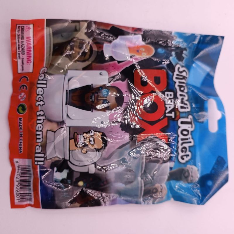 Jucarii, Copii si Bebe - Jucarii si jocuri - Figurine - Plic Skibidi Toilet Beat Box, cu Figurina si Cartonase Surpriza, 9 cm - Infinity.ro