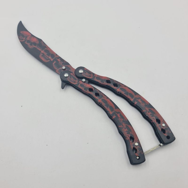 Sport si Outdoor - Camping - Cutite, bricege si accesorii - Cutite si bricege - Cutit Fluture Fara Tais Pentru Antrenament, Model Cap de Mort Rosu, Curbat, 24 cm - Infinity.ro