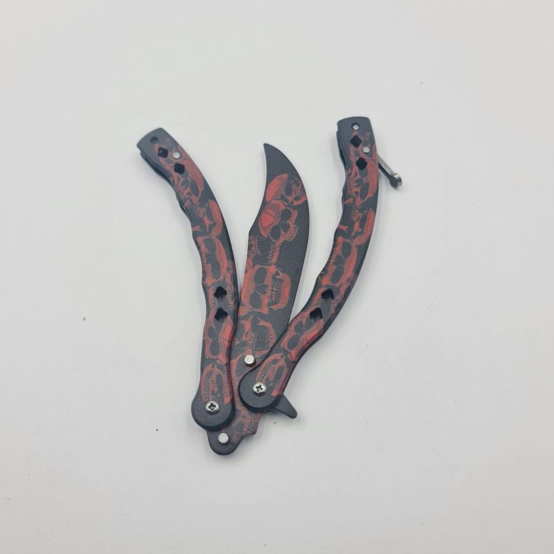 Sport si Outdoor - Camping - Cutite, bricege si accesorii - Cutite si bricege - Cutit Fluture Fara Tais Pentru Antrenament, Model Cap de Mort Rosu, Curbat, 24 cm - Infinity.ro