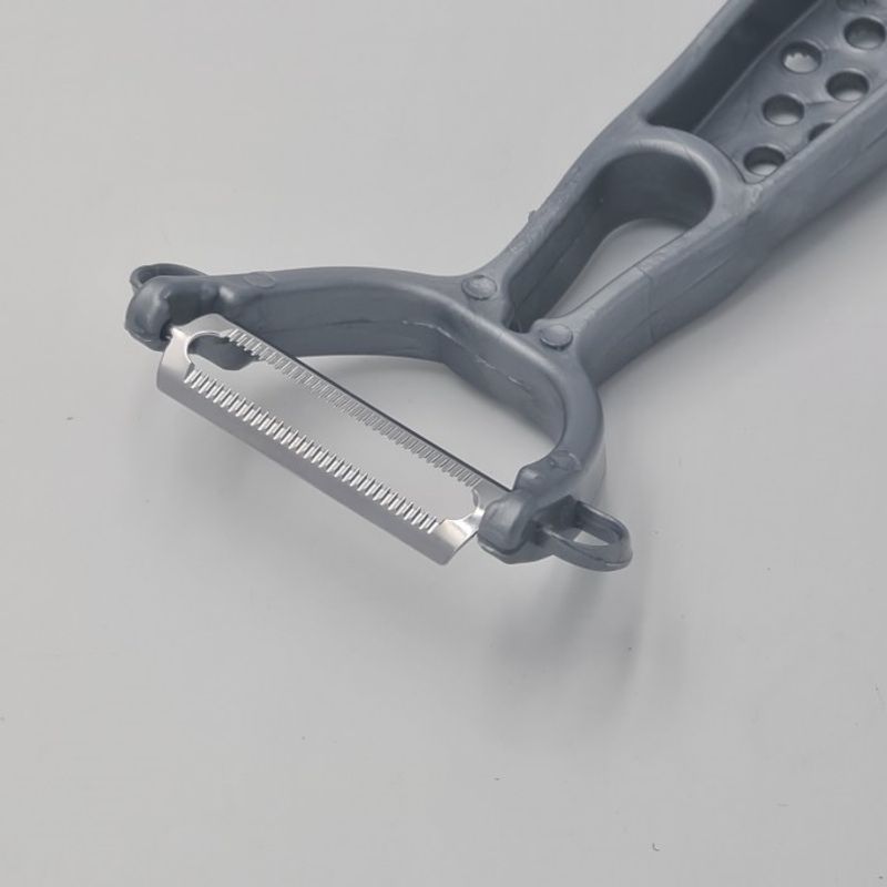 Casa si Gradina - Bucatarie si vesela - Ustensile bucatarie - Razatori si curatatoare - Curatator legume, model simplu, gauri, gri, 17 x 7 cm - Infinity.ro