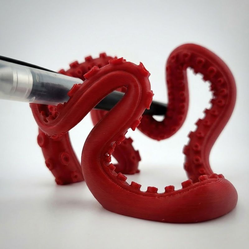 Carti si Birotica - Birotica - Accesorii de birou - Suporturi accesorii birou - Suport Pixuri Sculptural Tentacule, Rosu, 10 cm - Infinity.ro