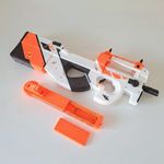 Jucarii, Copii si Bebe - Jucarii si jocuri - Jucarii de rol - Arme de jucarie - Mitraliera P90 Asiimov, replica realista, 56 cm, Counter Strike 2, CS GO, mecanism propulsat elastice pana la 15m - Infinity.ro
