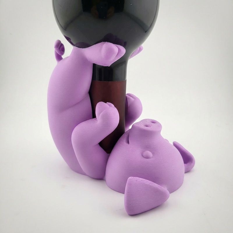 Casa si Gradina - Bucatarie si vesela - Accesorii bar - Suporturi bauturi - Suport Sticla de Vin Figurativ Amuzant, Mov, 10 cm - Infinity.ro