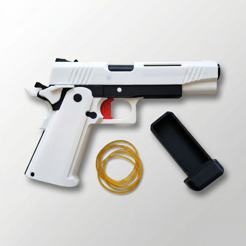 Jucarii, Copii si Bebe - Jucarii si jocuri - Jucarii de rol - Arme de jucarie - Pistol cu Elastice Silueta Urbana, Alb, 15 cm - Infinity.ro