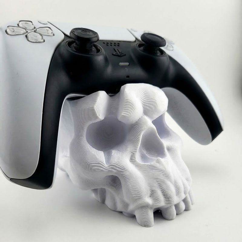 PC, gaming si accesorii - Gaming - Accesorii gaming - Accesorii console gaming - Suport Controller cu Design Craniu, Alb, 13 cm - Infinity.ro