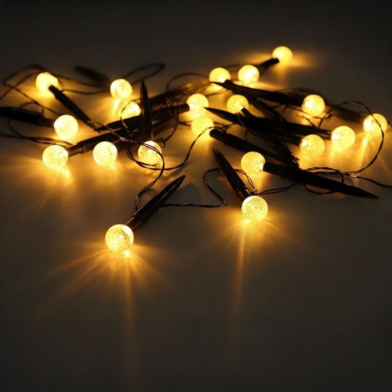 Casa si Gradina - Corpuri si surse de iluminat - Iluminat exterior - Lampi solare - Set de lumini solare de gradina, tip ghirlanda cu 10 LED-uri IP44, 3.8M, 1.2v, Jumi - Infinity.ro