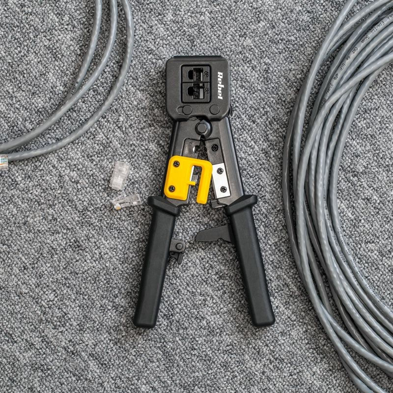 Casa si Gradina - Constructii - Scule de mana si unelte - Clesti si patenti - Cleste sertizare RJ45 RJ12 RJ11 RJ 6P RJ 8P + cutit pentru dezizolare REBEL RB-1007 - Infinity.ro