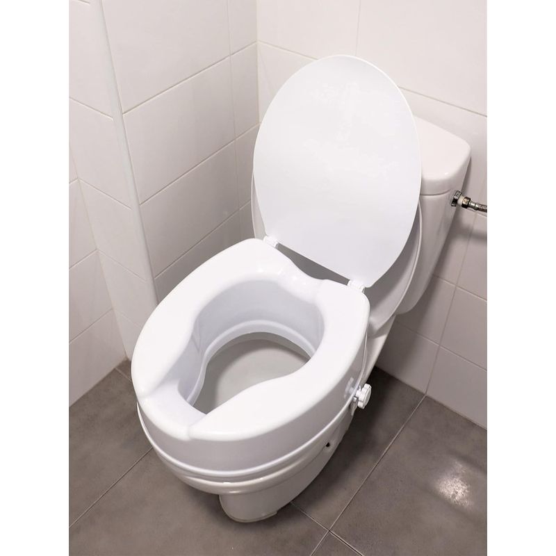 Casa si Gradina - Sanitare - Obiecte sanitare - Accesorii vase de toaleta - Inaltator WC universal cu capac, inaltime 15 cm, sistem de prindere reglabil, sarcina maxima 200 kg - Infinity.ro