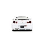 Jucarii, Copii si Bebe - Jucarii si jocuri - Vehicule si jucarii cu telecomanda - Masinute - JADA SET FIGURINA METALICA 6CM SI MASINUTA NISSAN SKYLINE GTR SCARA 1 LA 24 - Infinity.ro