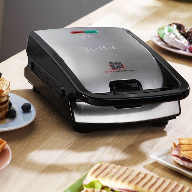 Electronice si Electrocasnice - Electrocasnice bucatarie - Preparare paine - Sandwich-maker - Sandwich maker multifunctional Snack Collection SW852D12, 700 W, 2 seturi de placi, sandwich si vafe, negru /argintiu - Infinity.ro
