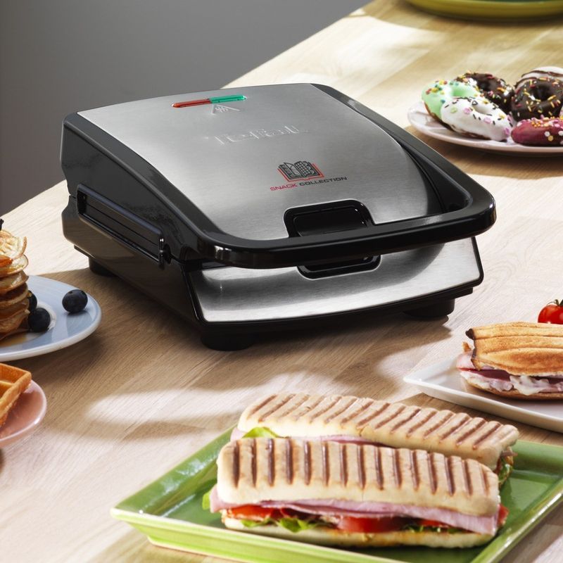 Electronice si Electrocasnice - Electrocasnice bucatarie - Preparare paine - Sandwich-maker - Sandwich maker multifunctional Snack Collection SW852D12, 700 W, 2 seturi de placi, sandwich si vafe, negru /argintiu - Infinity.ro