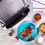 Electronice si Electrocasnice - Electrocasnice bucatarie - Aparate de gatit & desert - Gratare electrice - Gratar electric Tefal OptiGrill Elite GC750D30 cu 12 programe automate, termostat reglabil si carte de retete - Infinity.ro