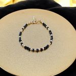Fashion, accesorii si bijuterii - Femei - Bijuterii femei - Bratari femei - Bratara dama handmade din Obsidian Amina cu bilute din argint placat cu aur - Infinity.ro
