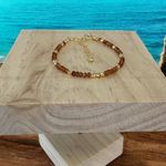 Fashion, accesorii si bijuterii - Femei - Bijuterii femei - Bratari femei - Bratara eleganta dama Farida cu granat portocaliu si argint placat cu aur 925 - Infinity.ro