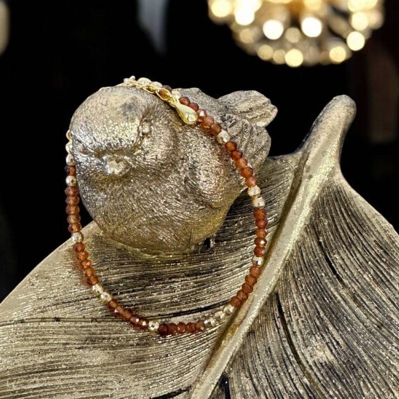 Fashion, accesorii si bijuterii - Femei - Bijuterii femei - Bratari femei - Bratara eleganta dama Farida cu granat portocaliu si argint placat cu aur 925 - Infinity.ro