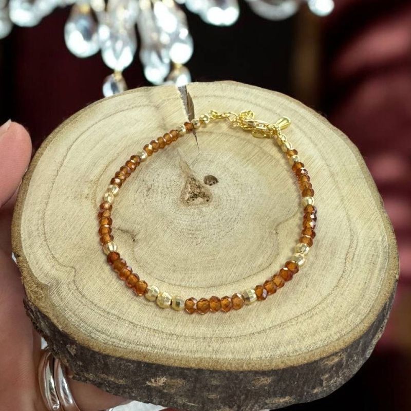 Fashion, accesorii si bijuterii - Femei - Bijuterii femei - Bratari femei - Bratara eleganta dama Farida cu granat portocaliu si argint placat cu aur 925 - Infinity.ro