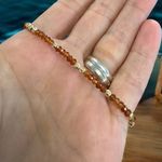 Fashion, accesorii si bijuterii - Femei - Bijuterii femei - Bratari femei - Bratara eleganta dama Farida cu granat portocaliu si argint placat cu aur 925 - Infinity.ro