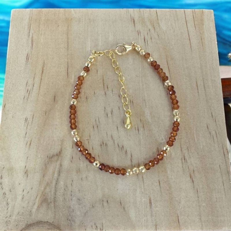 Fashion, accesorii si bijuterii - Femei - Bijuterii femei - Bratari femei - Bratara eleganta dama Farida cu granat portocaliu si argint placat cu aur 925 - Infinity.ro