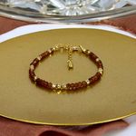 Fashion, accesorii si bijuterii - Femei - Bijuterii femei - Bratari femei - Bratara eleganta dama Farida cu granat portocaliu si argint placat cu aur 925 - Infinity.ro