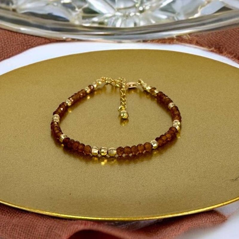 Fashion, accesorii si bijuterii - Femei - Bijuterii femei - Bratari femei - Bratara eleganta dama Farida cu granat portocaliu si argint placat cu aur 925 - Infinity.ro