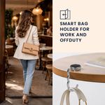 Casa si Gradina - Mobilier - Feronerie si accesorii mobila - Set 2 carlige de masa pentru geanta Kwmobile, inchidere magnetica, pliabile, anti-alunecare, metal, negru, argintiu - Infinity.ro