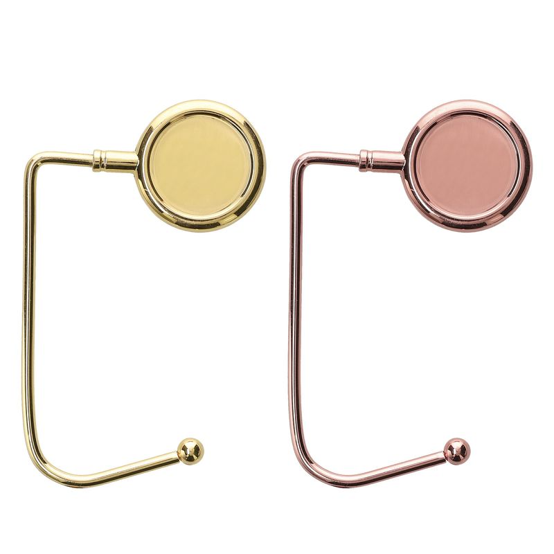 Casa si Gradina - Mobilier - Feronerie si accesorii mobila - Set 2 carlige pliabile de masa pentru geanta Kwmobile, anti-alunecare, metal, auriu - Infinity.ro