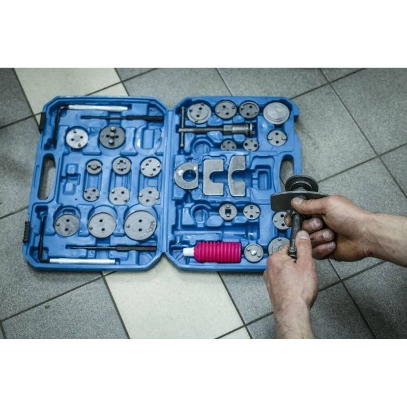 Auto si Moto - Reparatii si depanare - Scule auto - Scule si truse auto - Set 35 buc Presa etrier universala pentru repararea pistoanelor de frana + valiza, TA1373 - Infinity.ro