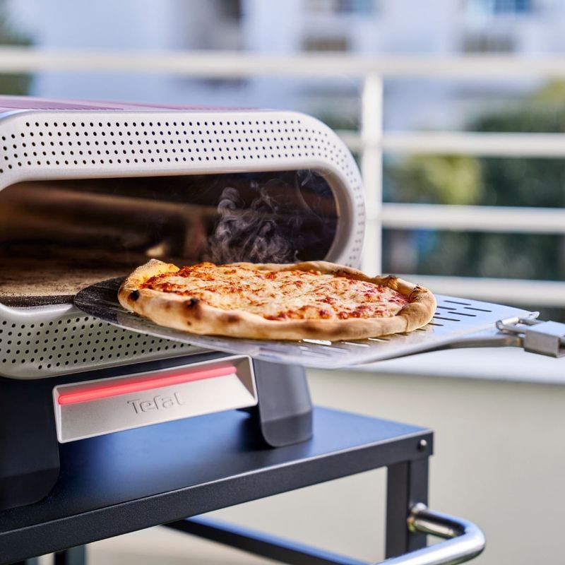 Electronice si Electrocasnice - Aragazuri, cuptoare si hote - Cuptoare - Cuptoare electrice - Cuptor electric pentru pizza Tefal Pizza Pronto JM600TE0, 2600 W, 4 trepte de temperatura, piatra rotativa automata - Infinity.ro