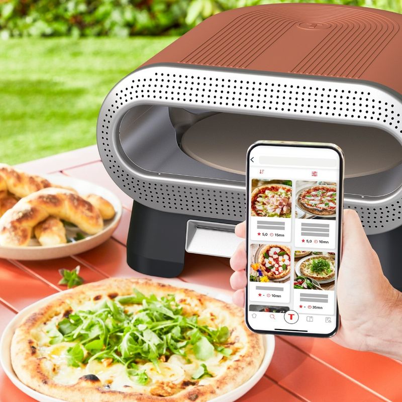 Electronice si Electrocasnice - Aragazuri, cuptoare si hote - Cuptoare - Cuptoare electrice - Cuptor electric pentru pizza Tefal Pizza Pronto JM600TE0, 2600 W, 4 trepte de temperatura, piatra rotativa automata - Infinity.ro