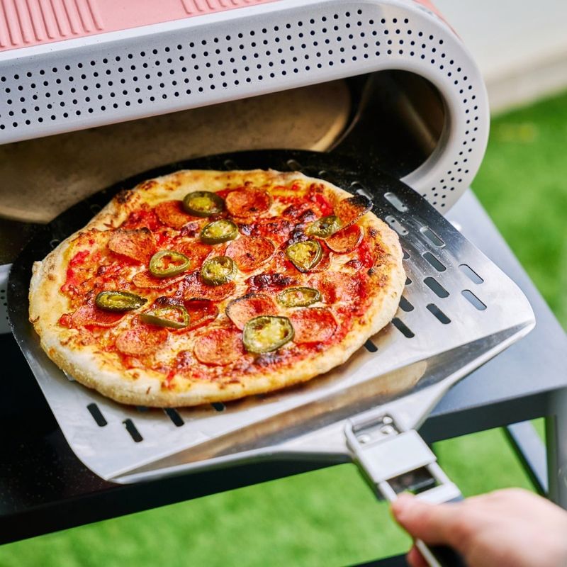 Electronice si Electrocasnice - Aragazuri, cuptoare si hote - Cuptoare - Cuptoare electrice - Cuptor electric pentru pizza Tefal Pizza Pronto JM600TE0, 2600 W, 4 trepte de temperatura, piatra rotativa automata - Infinity.ro