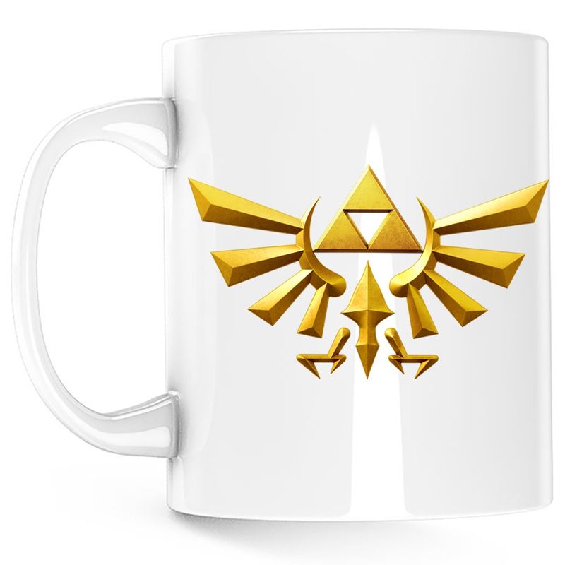 Casa si Gradina - Bucatarie si vesela - Cani si pahare - Cani si cesti - Cana Legend of Zelda Gold Logo, alba, 330 ml - Infinity.ro