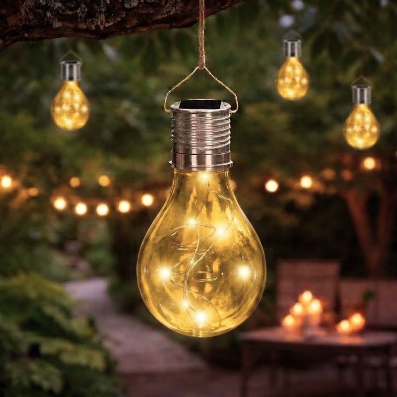 Casa si Gradina - Corpuri si surse de iluminat - Iluminat exterior - Lampi solare - Lampa solara in forma de bec galben transparent, LED, pentru gradina, terasa si exterior - Infinity.ro