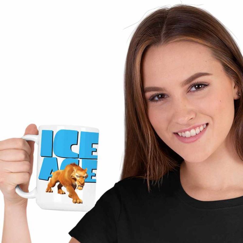 Casa si Gradina - Bucatarie si vesela - Cani si pahare - Cani si cesti - Cana Ice Age Diego Smilodon Tigru, alba, 330ml - Infinity.ro