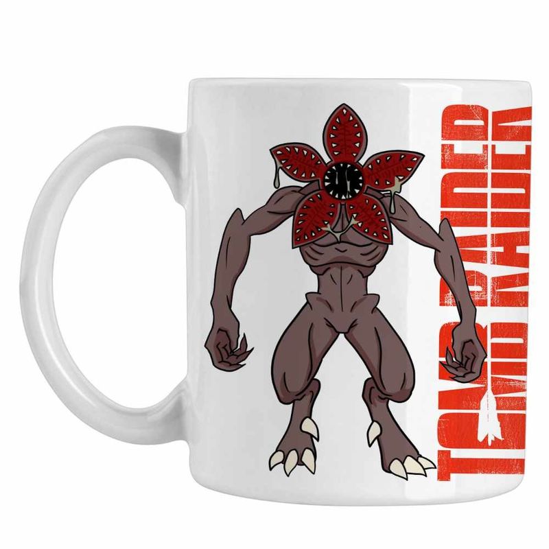 Casa si Gradina - Bucatarie si vesela - Cani si pahare - Cani si cesti - Cana Tomb Raider Logo Sageata Arc Lara Croft Armata CoolTrend, alba, 330ml - Infinity.ro