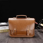 Fashion, accesorii si bijuterii - Barbati - Accesorii barbati - Genti si rucsacuri barbati - Geanta Business din Piele Ecologica Premium, Tip Servieta, cu Doua Catarame Metalice, Maro, 26 cm, 37 cm, 10 cm - Infinity.ro